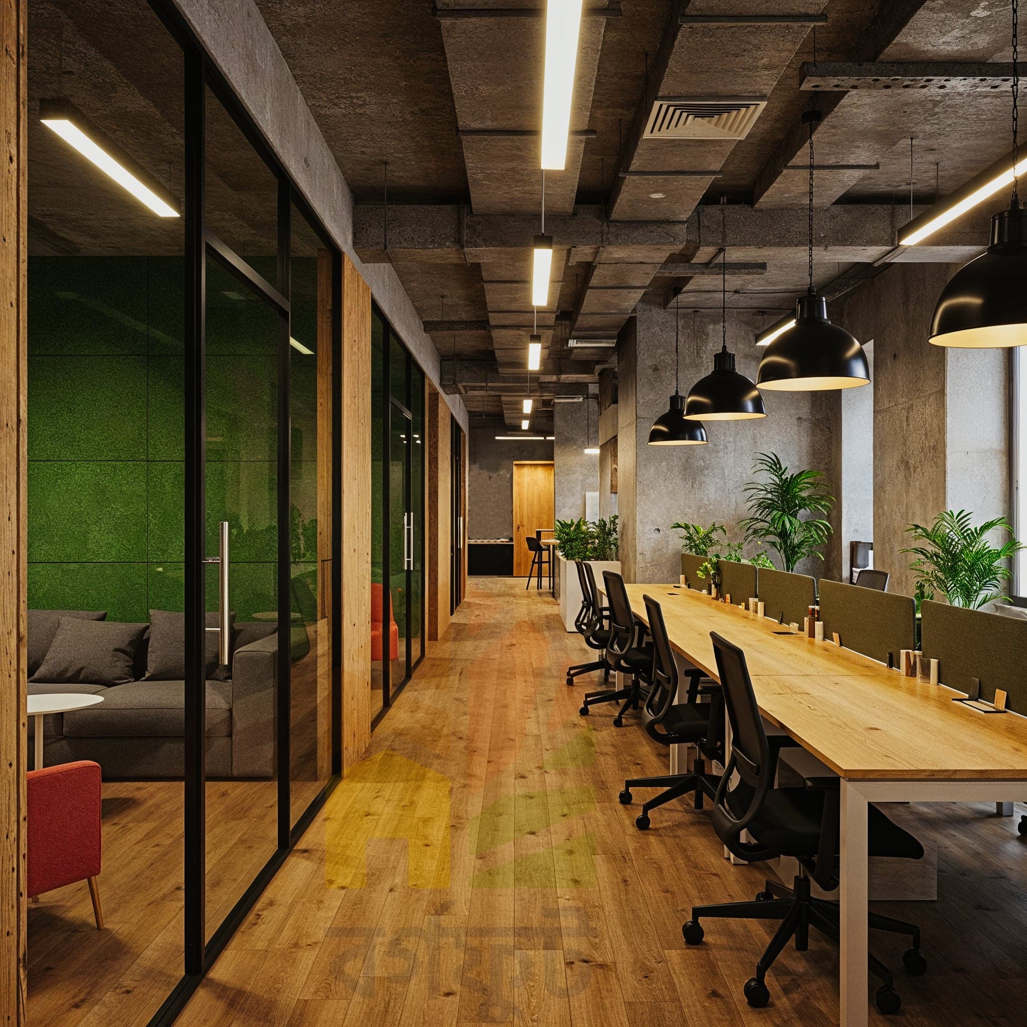A wide-angle, eye-level image of a modern, open-plan office meeting space. A large, circular light-wood table with grey chairs sits in the center. The room is surrounded by floor-to-ceiling windows with a view of a cityscape. Large wooden planters filled with various lush green plants line the windows, acting as a natural divider.